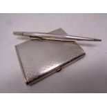 A silver card case together with propelling pencil