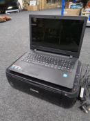 A Lenovo Ideapad laptop with charger together with a Canon Pixma MP495 wireless all in 1 printer