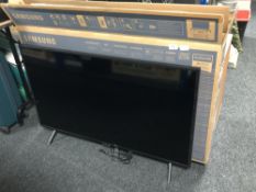 A Samsung UE 43RU7 100K 43'' smart TV with original box,