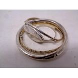 A quantity of silver and white metal bangles