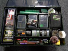 A plastic fishing box containing assorted fishing equipment to include tools, bate drills,