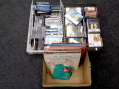 Three boxes containing vinyl LPs, DVDs and CDs,