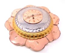 An Art Deco two tone glass wall clock in the form of a flower petal