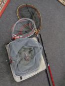 A Daiwa landing net together with a Pantera landing net head,