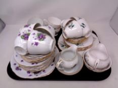 Two part sets of floral gilt tea china