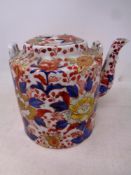 An early 20th century Chinese porcelain Imari lidded teapot with character marks to base,