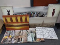 Seven assorted wall canvas depicting scenes of New York, London Underground map etc,
