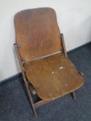 A mid 20th century American Acme Company folding campaign style chair