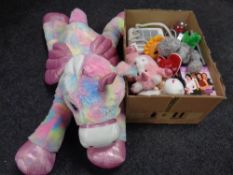 A large unicorn soft toy together with a box containing CD's, DVD's,