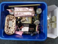 A crate containing eyeshadows, soaps, bath bombs, makeup bags,