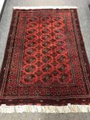 An Afghan Bokhara rug 205 cm x 146 cm