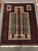 An Afghan prayer rug 131 x 100 cm