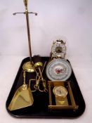 A tray containing quartz anniversary clock under shade, together with two further mantle clocks,