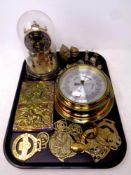 A tray containing an anniversary clock under shade, a ship's style brass cased barometer,
