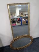 A gilt framed bevel edged hall mirror together with a further decorative gilt framed mirror