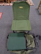 A Zebco folding fishing chair in carry bag together with a further folding fishing chair
