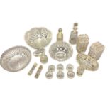 A collection of Victorian and later cut crystal and pressed glass to include bowls, knife rests,