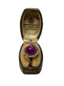 An 18ct yellow gold cabochon asterism ruby and diamond ring, 5.6g, size O.