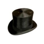 A vintage black top hat by Leonard's Hat Makers, internally measured 15.5 cm x 19.