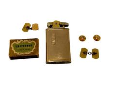 A Ronson lighter sleeved in 9ct gold, together with a pair of 9ct gold studs,