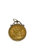 A George V gold sovereign, dated 1912, mounted as a 9ct gold rimmed pendant, 9.2g.