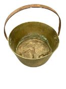 A heavy brass antique jam pan, diameter 31 cm, together with a Victorian copper bed warming pan.