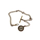 An 18ct yellow gold Albert chain with 10ct gold mounted compass fob, length 36 cm,