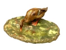 An early twentieth century cold painted bronze figure of a duck,