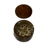 A late 19th / early 20th century brass pocket compass, diameter 5 cm.