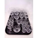 A tray of assorted lead crystal drinking glasses to include Edinburgh Crystal liqueur glasses