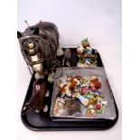 A tray containing assorted ceramic ornaments to include shire horses,