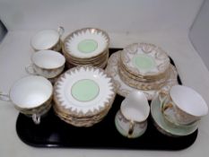 A tray of two part bone china tea services by Harrowby and Ashley