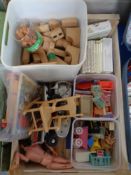 A crate of vintage toys including Beatrix Potter books, wooden blocks,