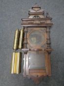 An antique mahogany cased wall clock (no workings),