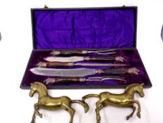 A pair of brass horse ornaments together with a four piece WA Colley carving set in case