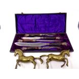 A pair of brass horse ornaments together with a four piece WA Colley carving set in case