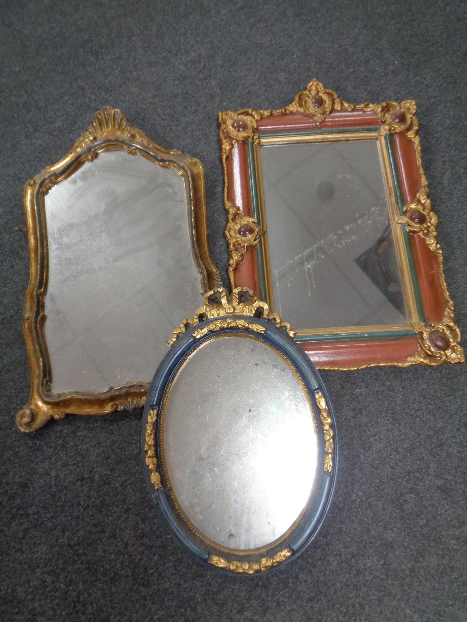 A French style painted wooden mirror together with two further painted mirrors