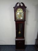 A Tempus Fugit longcase clock with pendulum and weights