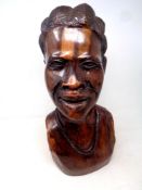 A carved hardwood African bust