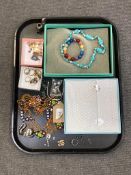 A collection of costume jewellery, necklace in box, dress rings etc.