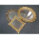 Three decorative gilt plastic framed mirrors