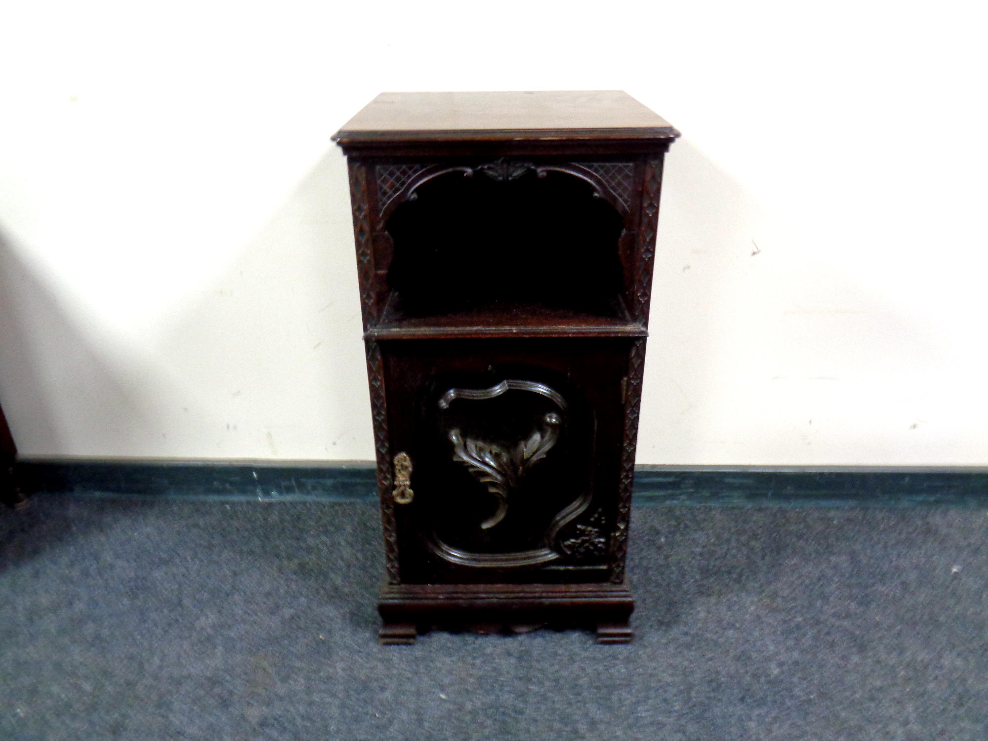 A late Victorian mahogany pot cupboard,