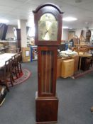 A Tempus Fugit longcase clock with pendulum and weights