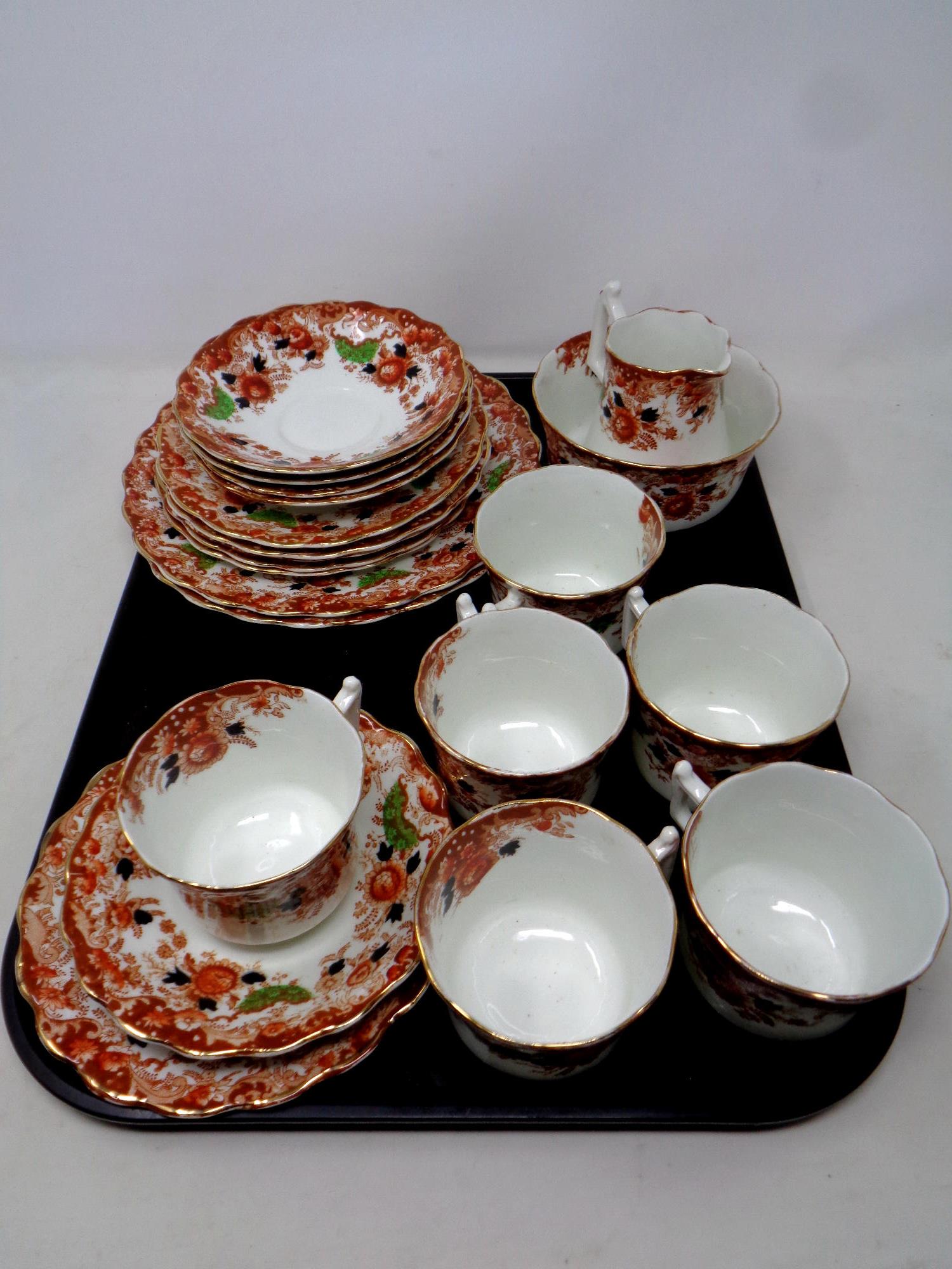 A twenty one piece antique Wellington bone china tea service