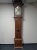 A 19th century oak longcase clock with brass and silvered dial signed H Smith of Mareboe,