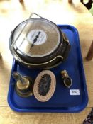 A tray containing Salter scale, brass bell and boot ornament,