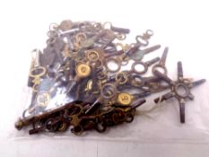 Approximately 67 antique pocket watch keys, 8 with jeweler's address,