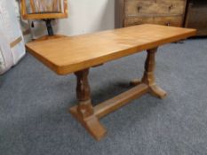 A Robert 'Mouseman' Thompson of Kilburn adzed oak 3ft coffee table, with carved mouse signature,