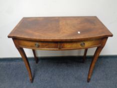 A Regency style mahogany side table fitted two drawers