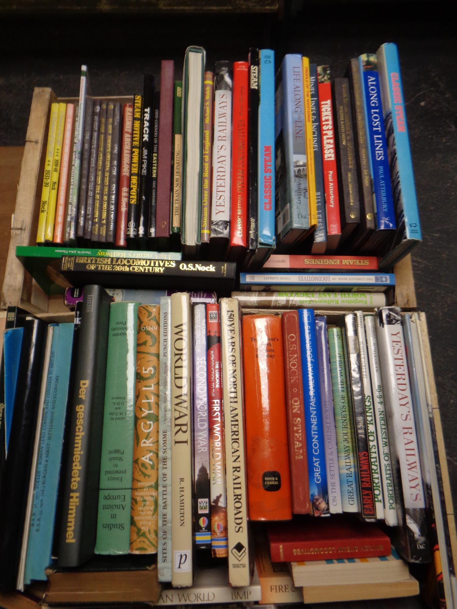 Two crates of hardbacked books relating to trains and railways,